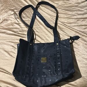 Black MCM bag in perfect condition !